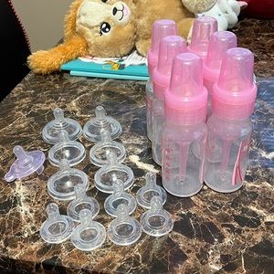 6 Dr. Brown 4oz bottles, 4 - 5oz and 13 size 1 nipples